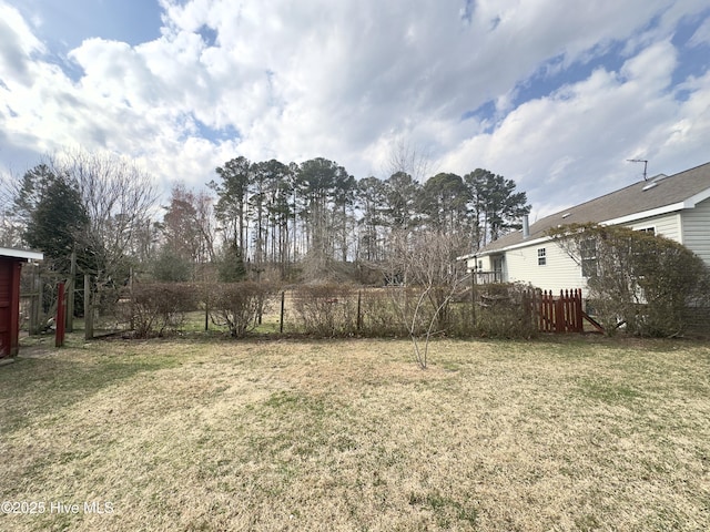 view of yard with fence