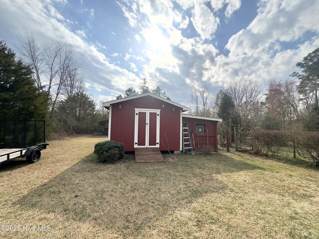 view of outbuilding with an outbuilding