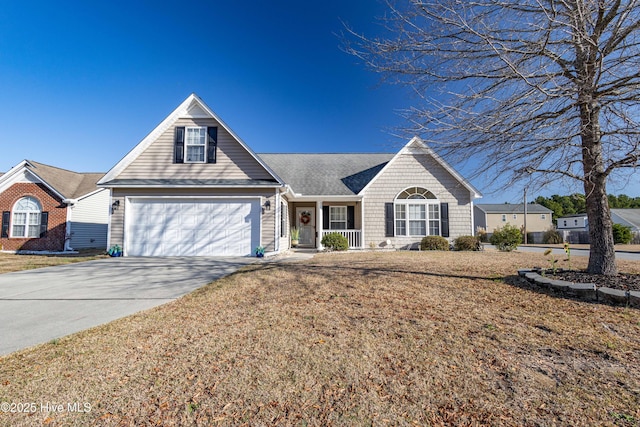 view of front of house featuring concrete driveway, a garage, and a front lawn