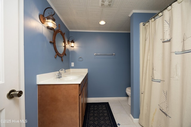 bathroom featuring visible vents, toilet, vanity, and ornamental molding