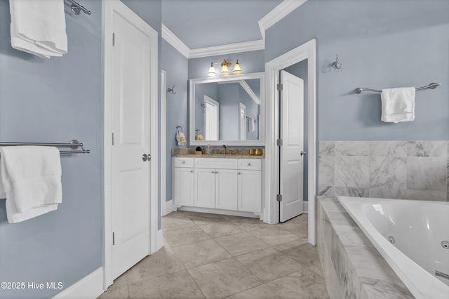 full bathroom featuring a whirlpool tub, baseboards, vanity, and crown molding