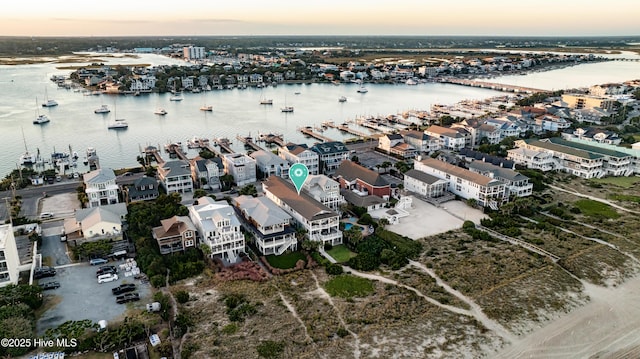 drone / aerial view featuring a water view