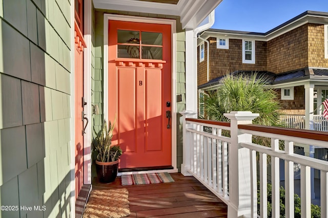 doorway to property featuring a porch