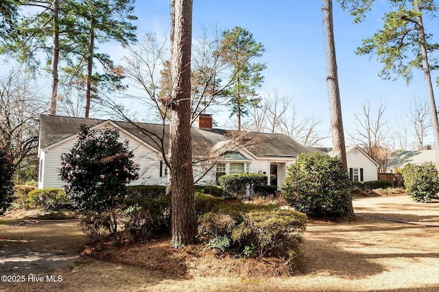 view of front of home with a chimney