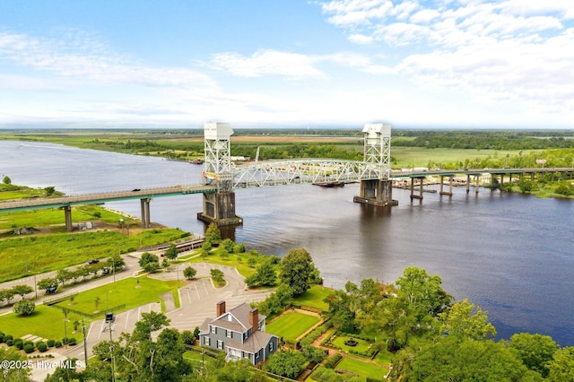 drone / aerial view with a water view