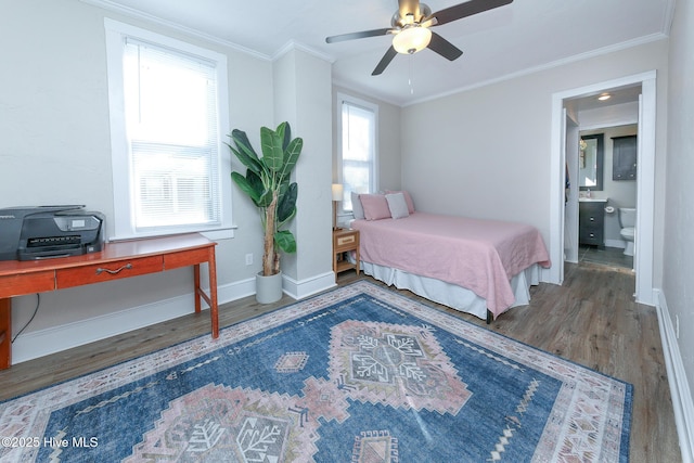 bedroom featuring a ceiling fan, baseboards, ornamental molding, and wood finished floors