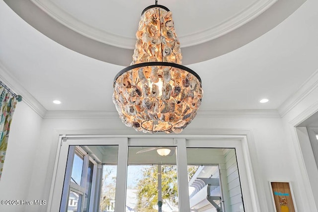 details with ornamental molding, a notable chandelier, and recessed lighting