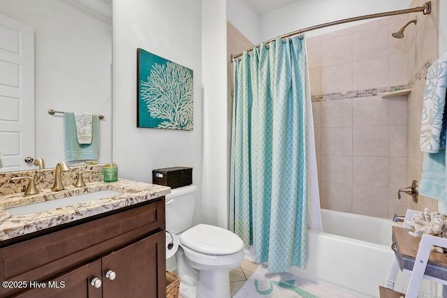 full bath with toilet, shower / tub combo, tile patterned flooring, and vanity