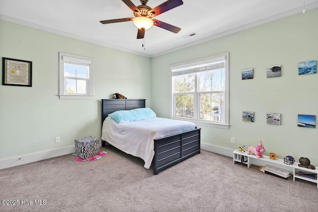 bedroom featuring carpet, visible vents, crown molding, and multiple windows