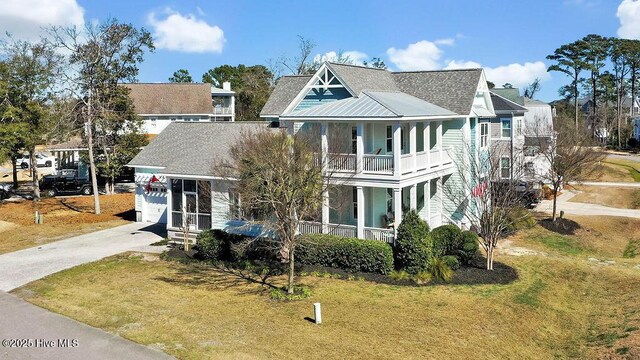 view of front of house featuring an attached garage, central AC, a shingled roof, fence, and driveway