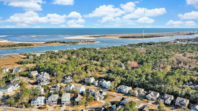 aerial view featuring a residential view and a wooded view