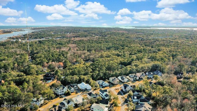 aerial view with a forest view and a residential view