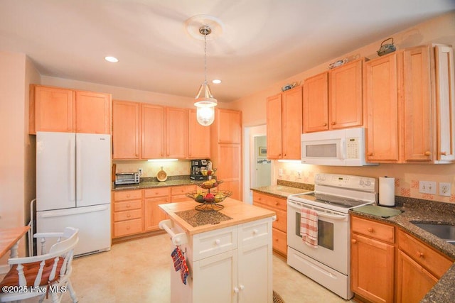 kitchen with light brown cabinetry, decorative light fixtures, a center island, recessed lighting, and white appliances