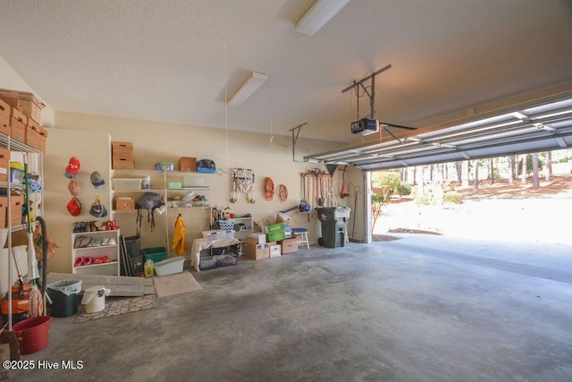 garage featuring a garage door opener