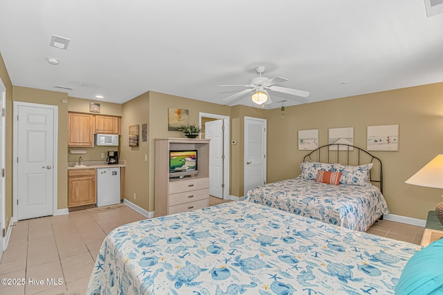 bedroom with visible vents, baseboards, a ceiling fan, and light tile patterned flooring