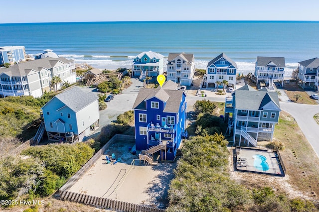 bird's eye view featuring a residential view and a water view