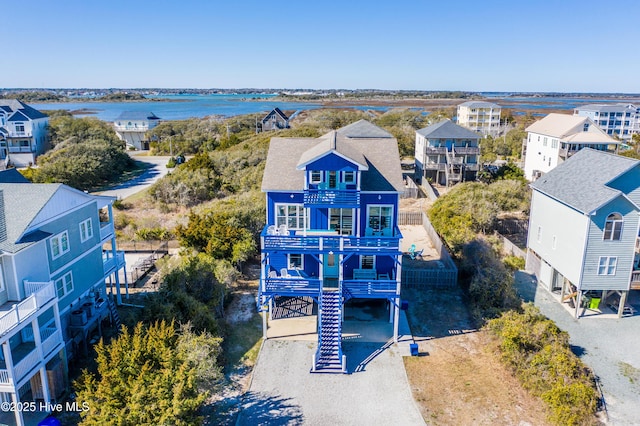 birds eye view of property with a residential view