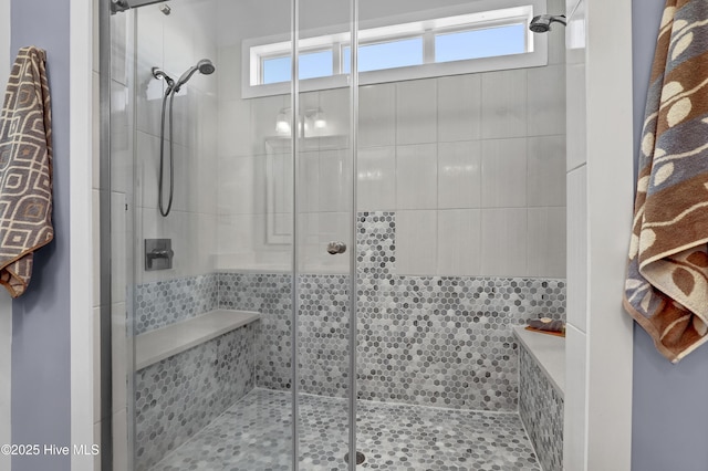 bathroom featuring a shower stall