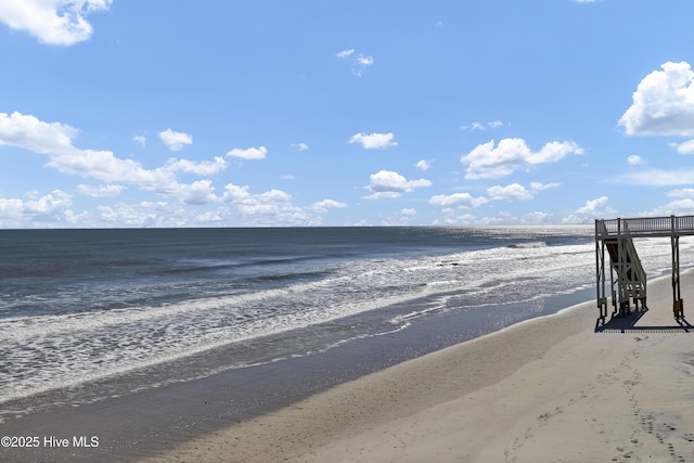 property view of water featuring a beach view