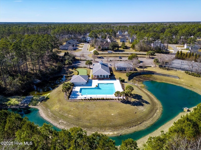 bird's eye view featuring a water view and a view of trees