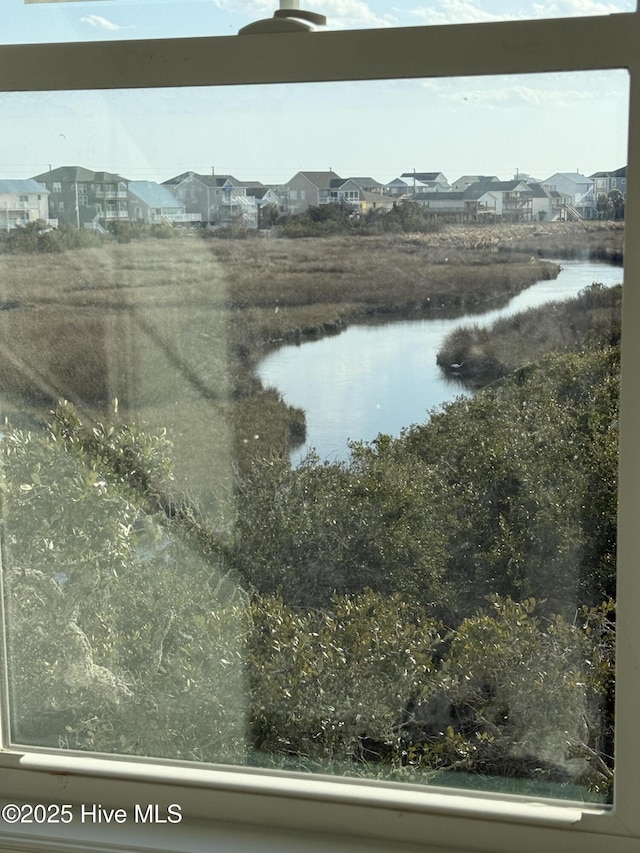 view of water feature with a residential view