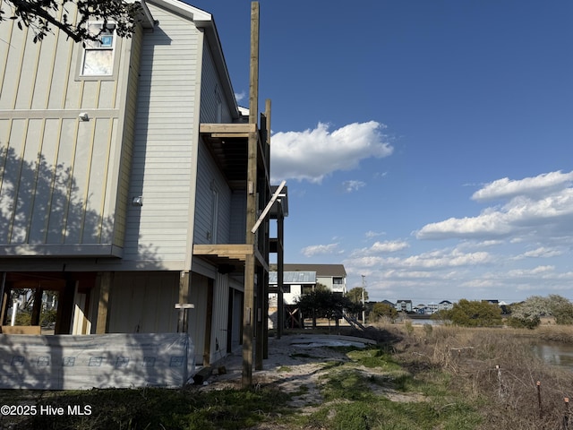 view of side of property with board and batten siding