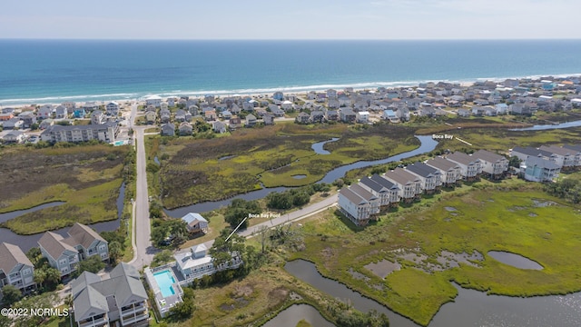 birds eye view of property with a residential view and a water view