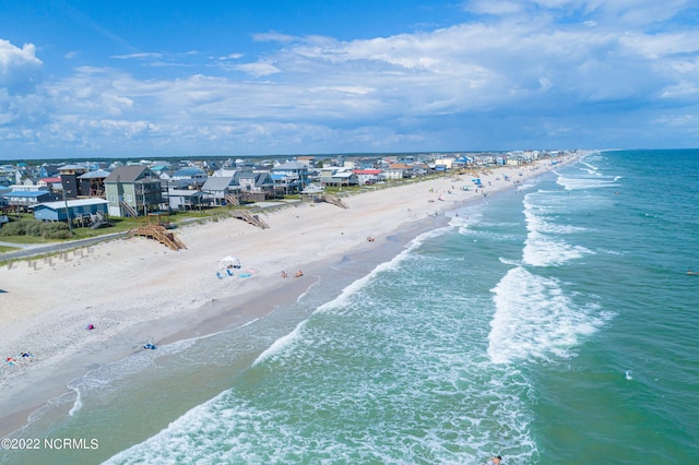 aerial view with a beach view and a water view