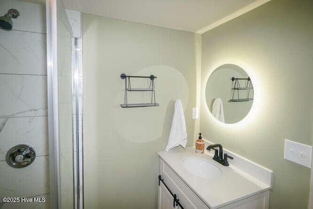 226 NE 76th St, Oak Island, NC 28465 - full bathroom featuring vanity and an enclosed shower