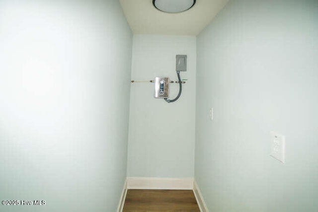 226 NE 76th St, Oak Island, NC 28465 - detailed view of wood finished floors and baseboards