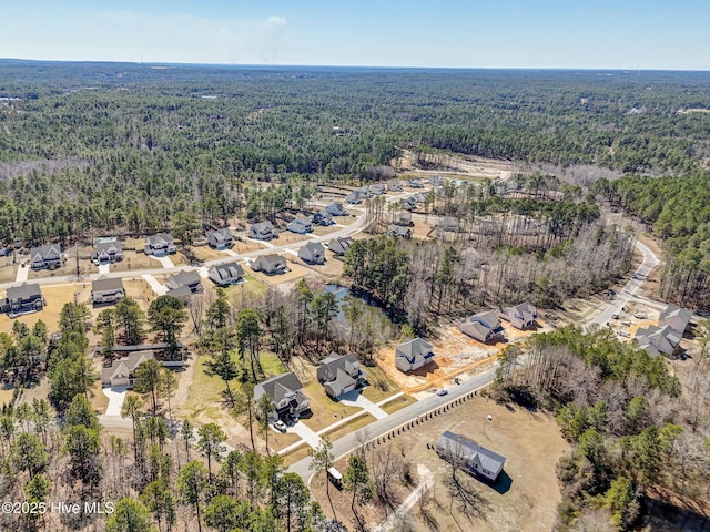 aerial view with a forest view