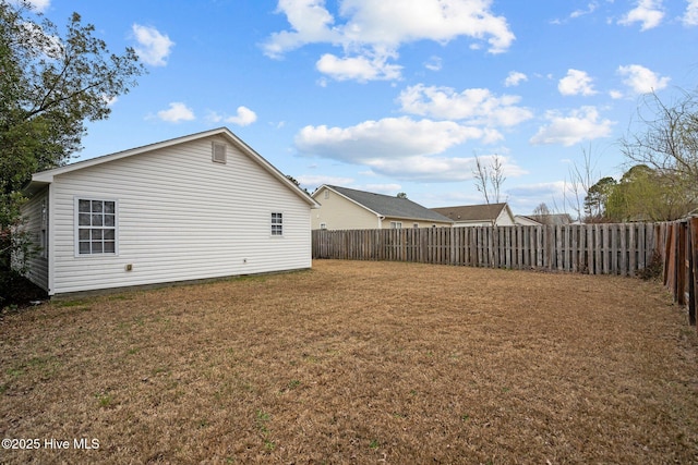 exterior space with a fenced backyard