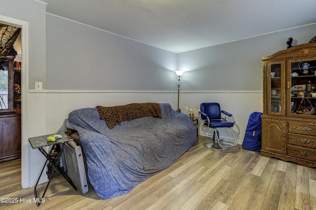 bedroom with wood finished floors