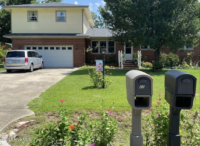 view of front of home with driveway, brick siding, a front lawn, and an attached garage