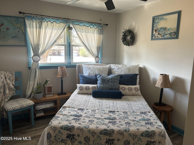 bedroom featuring wood finished floors