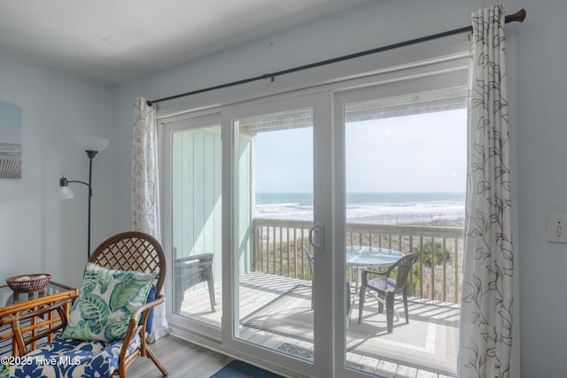 918 N New River Dr Unit 728, Surf City, NC 28445 - entryway with a view of the beach, wood finished floors, and a water view