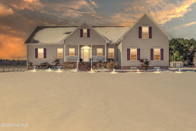 view of front of house featuring covered porch and crawl space