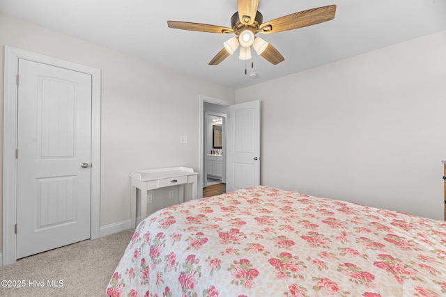 carpeted bedroom with a ceiling fan