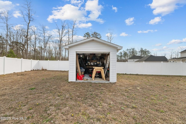 view of shed featuring a fenced backyard