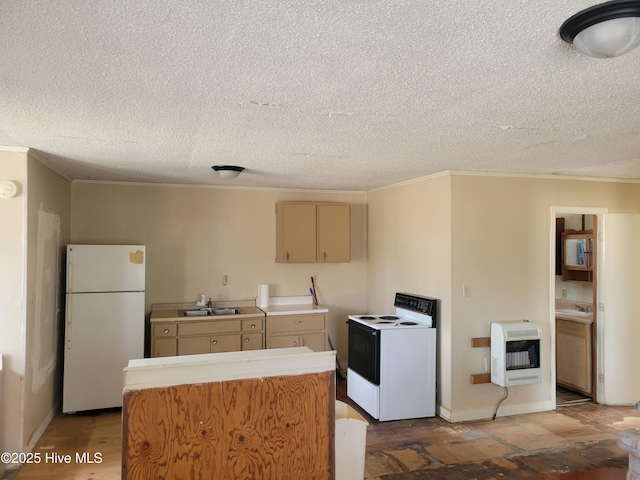 kitchen featuring crown molding, white appliances, a sink, and heating unit