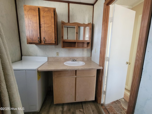 bathroom featuring vanity and wood finished floors