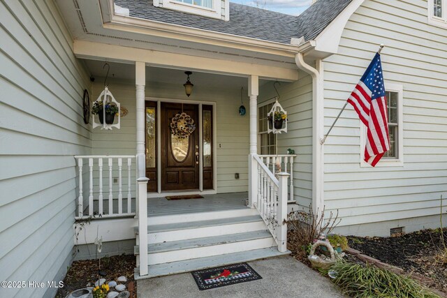 122 Charlie Lewis Ln, Beaufort, NC 28516 - doorway to property featuring roof with shingles and a porch