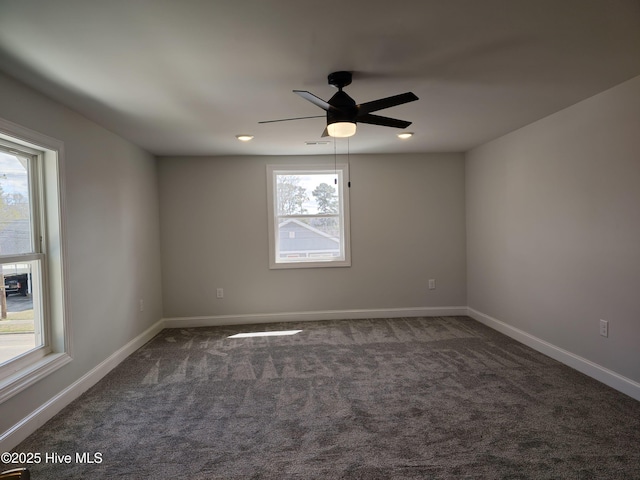 empty room featuring visible vents, a ceiling fan, recessed lighting, carpet floors, and baseboards