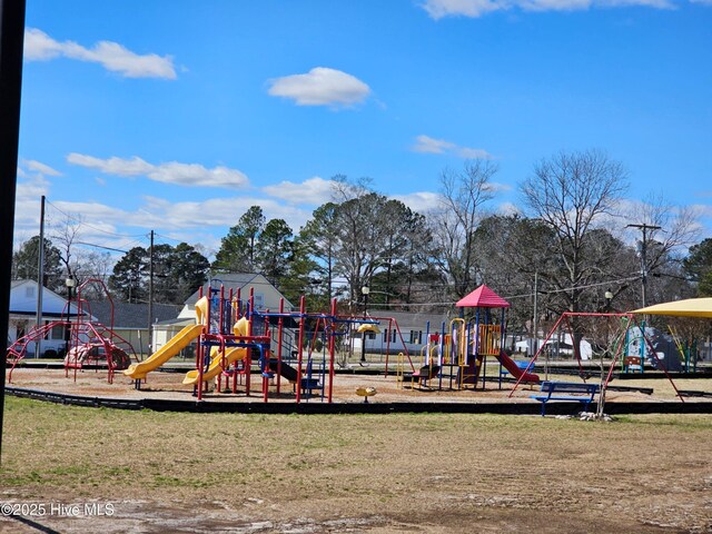 community play area with a yard