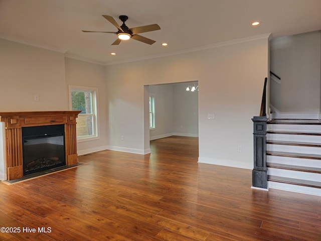 unfurnished living room with crown molding, stairway, recessed lighting, and wood finished floors