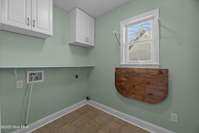 laundry room featuring washer hookup, cabinet space, hookup for an electric dryer, a textured ceiling, and baseboards