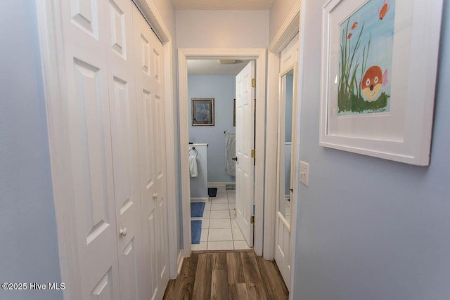 hall with dark wood finished floors