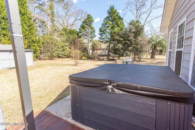 exterior space with a hot tub