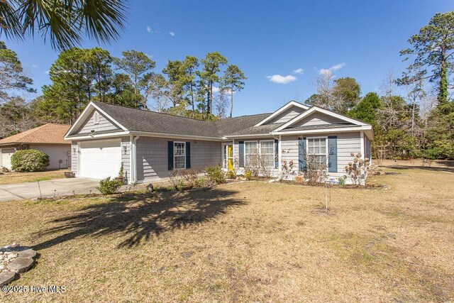 single story home with a garage, concrete driveway, and a front yard