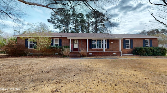 single story home with crawl space and brick siding